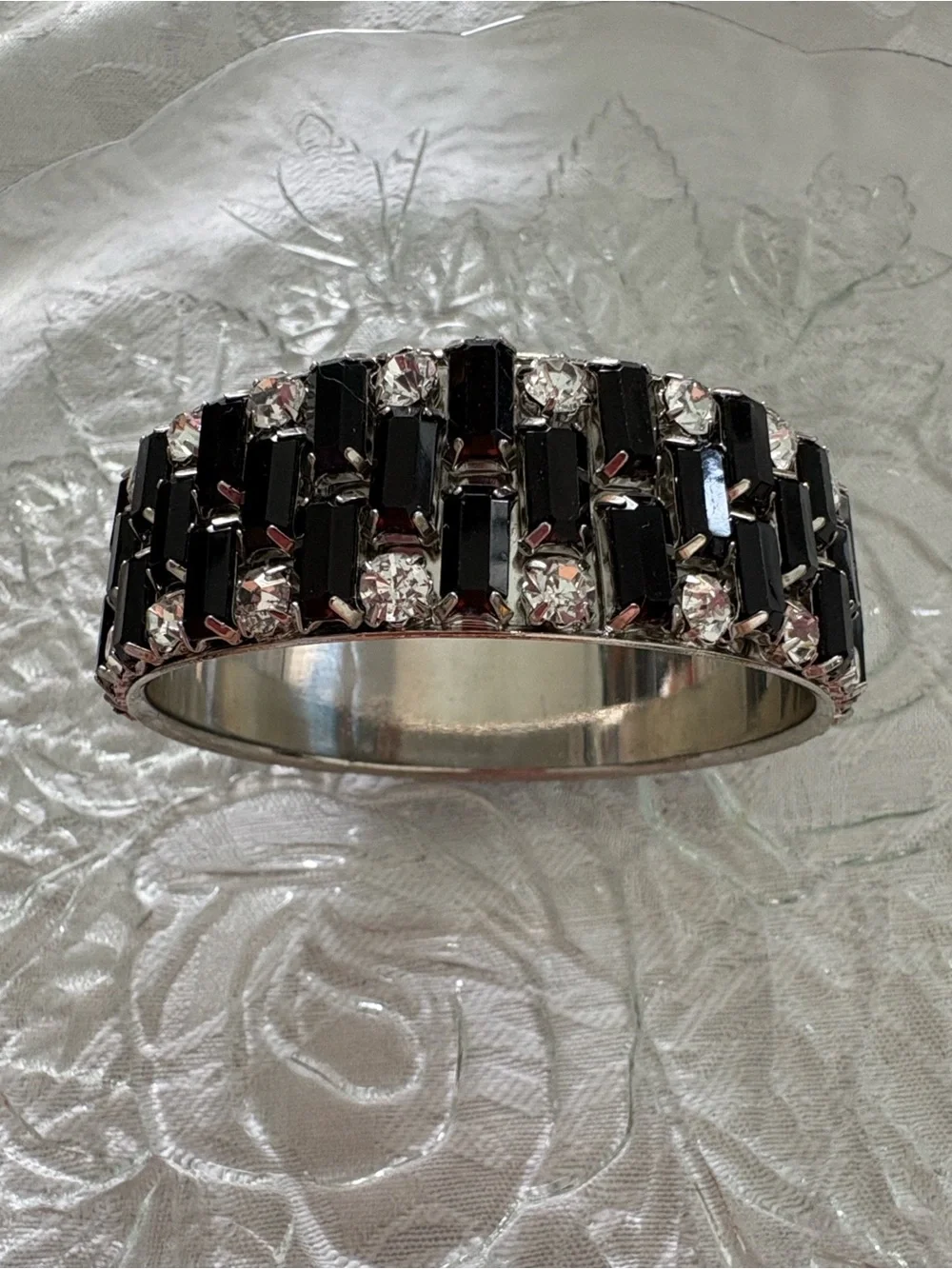Elegant Silver Bangle Bracelet with Black and Clear Rhinestones.